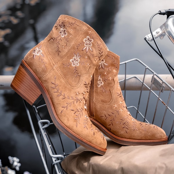 Featuring the Sophie heeled bootie in Brown. Shop Sophie.